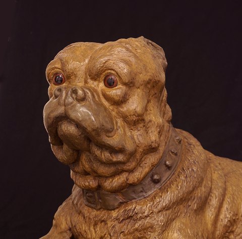 Large lying dog, terracotta. France circa 1880. H: 
72cm. L: 33cm