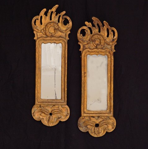 A pair of small Rococo mirrors. Denmark circa 
1760. 55x19cm