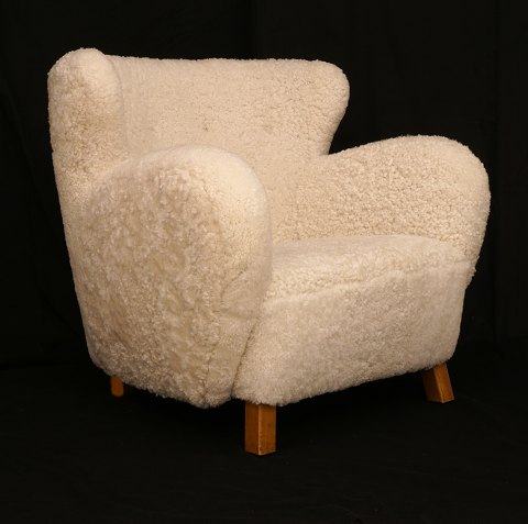 Danish Design: Easy chair upholstered with 
sheepskin. Denmark circa 1935