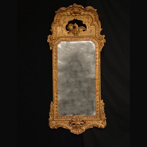 A gilt Rococo mirror. Sweden circa 1750. Size: 
108x50cm