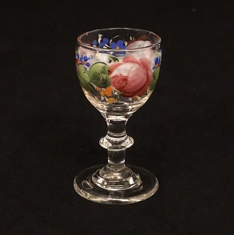 An enamel decorated glass. Made circa 1860. H: 
8,8cm