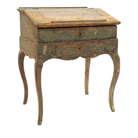 Rococo writing desk with cabriole legs. Scraped to 
it's original color with light retouches. Sweden 
circa 1770. H: 99cm. W: 82cm. D: 62cm