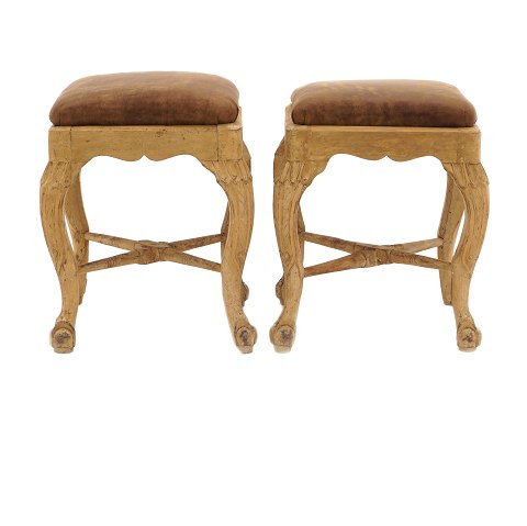 Pair of Rococo stools with "claw and ball" feet. 
Sweden circa 1760. H: 44cm. W: 37cm. L: 37cm