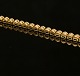 Tennisarmbånd, 18kt guld, med 57 diamanter. L: 19,5cm