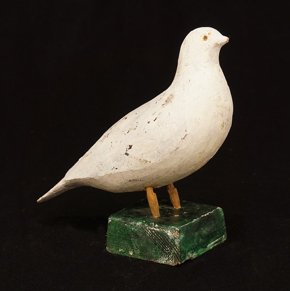 Swedish folkart: A bird, wood. Late 19th Century. H: 20cm. L: 23cm