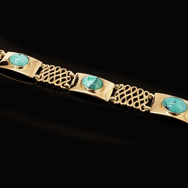 A 18ct gold Georg Jensen bracelet from the period 1933-44. L: 19cm. W: 25,8gr