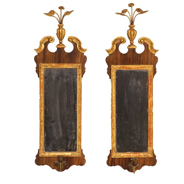 A pair of partly gilt  walnut mirrors. Denmark or northern Germany. Size: 
82x26cm