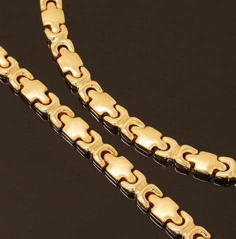 Smykkesæt bestående af halskæde og armbånd. 14kt guld