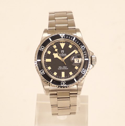 Tudor Submariner Snowflake black, reference 94110. 
Year 1975. D: 40mm