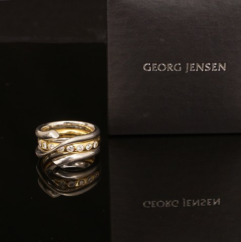 Regitze Overgaard für Georg Jensen: Magic Ring, 
18kt Gold, mit neun Brillanten. Ringgr. 53