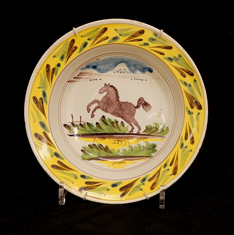 Kellinghusen plate with horse circa 1800. D: 
23,5cm