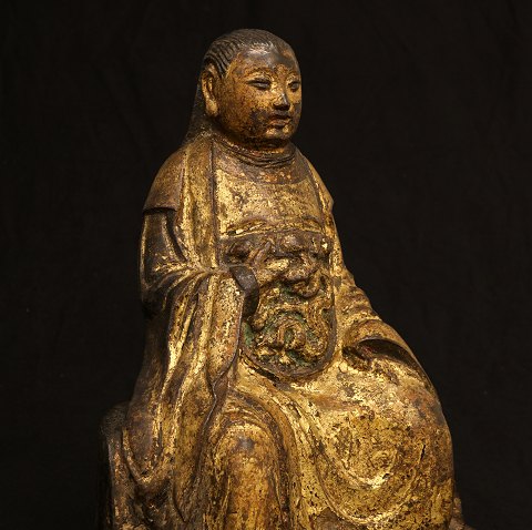 A Gilt-lacquered bronze figure of Zhenwu. Late 
Ming Dynasty circa 1600. H: 34cm