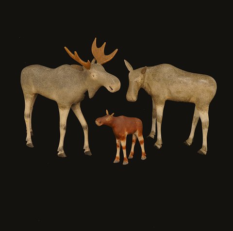 Set of three elks, wood. Sweden circa 1880. H: 
16-32cm