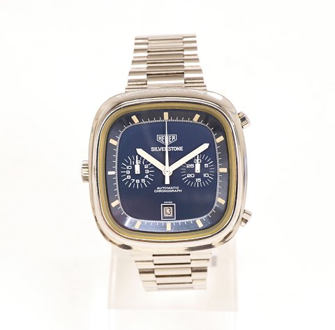 Heuer Silverstone, Blaues Zifferblatt. Ref. 
110.313B
Jahrgang 1974.
Caliber 12.
Masse: 44x42mm. Sehr guter Zustand