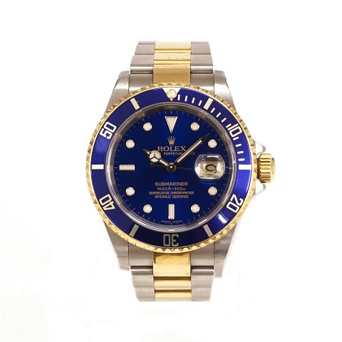 Rolex Submariner Gold/Stahl, Ref. 16613. Jahrgang 
2005. D: 40mm. Wird mit Box und Zertifikat 
geleifert