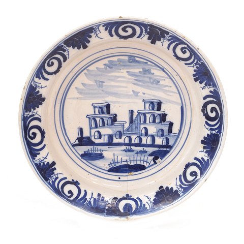 Signed St. Kongensgade Copenhagen faience plate. 
Denmark circa 1740. D: 28,5cm