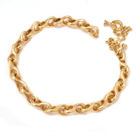 Ole Lynggaard 8-tals armlænke i 14kt guld. Ledstr. 
7x13mm. L: 18cm (kraftige led i kæde)