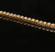 Tennis wrist band, 18ct gold with 57 diamonds