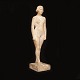 A patinated plaster sculpture of a naked woman. Denmark circa 1915-20. H: 20cm