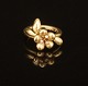 Ole Lynggaard, Denmark: Flower Ring with 3 diamonds. 18ct gold. Ringsize: 54