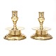 Pair of early 17th century bell shaped brass candlesticks. H: 13,5cm