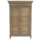 Lys grågrøn vitrine med to døre og fem hylder. Ca. år 1850. H: 213cm. B: 139cm. 
D: 36cm (top) / 25cm (midt)