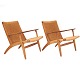 Pair of original and very nice patinated Hans J. Wegner CH25 lounge chairs, oak. Manufactured by Carl Hansen & Son