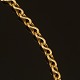 18kt gold necklace by Ole Lynggaard, Copenhagen. L: 54cm. W: 75,3gr