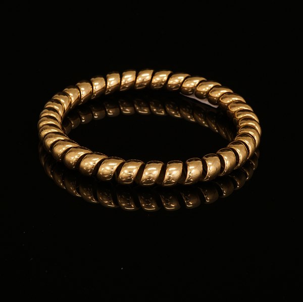 Anton Michelsen: Spiral armring af 14kt guld. Stemplet. D: 7,7cm. V: 31,2gr