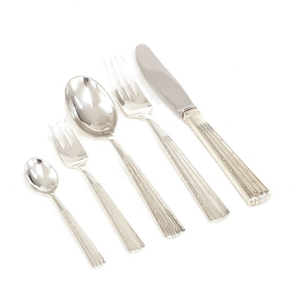 Jens Harald Quistgaard, Denmark: Champagne silver cutlery for 12 persons. (69)