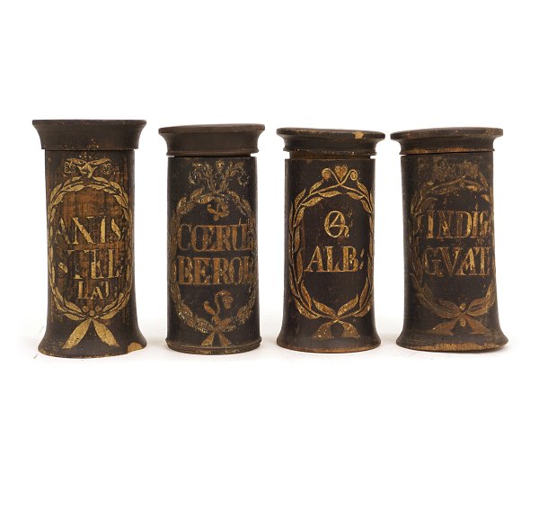 Four wood cut drugstore jars. Circa 1780. H: ca. 21cm