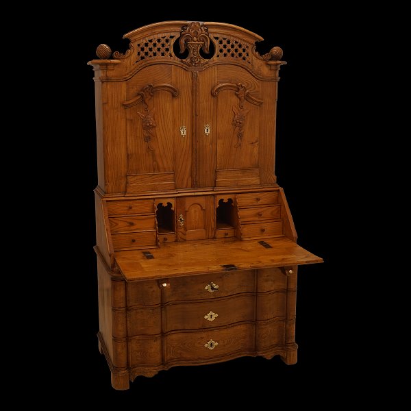 A Danish Louis XVI elm cabinet. Southern Denmark circa 1770. H: 201cm. W: 118cm. 
D: 88cm