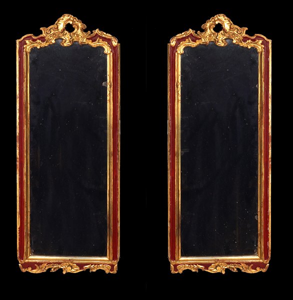 A pair of mid 18th century Rococo partly gilt mirrors. Circa 1760. Size: 
75x29,5cm