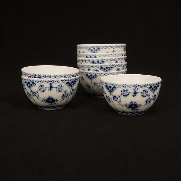 A set of nine Royal Copenhagen blue fluted full lace small bowls. #1142-4. H: 
6,3cm