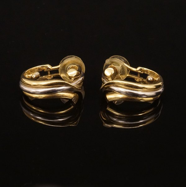 Ein Paar Georg Jensen 18kt Gold Ohrclips. #1488. Masse: 20x18mm