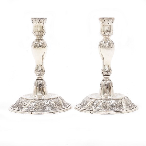 Pair of sterlingsilver candlesticks by Axel Salomonsen, Copenhagen. H: 18,8cm. 
W: 748gr