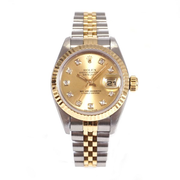 Rolex Oyster Perpetual Datejust G/S ref. 69173. D: 26mm. Champagnefarvet skive m 
timemarkører i form af diamanter. Leveres med boks og certifikat. Årgang 1996. 
Leveres nyserviceret