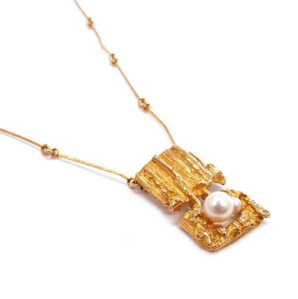 Lapponia halskæde af Björn Weckström udført i 14kt guld 1971. Halskæde L: 45cm. Vedhæng: 28x16mm
